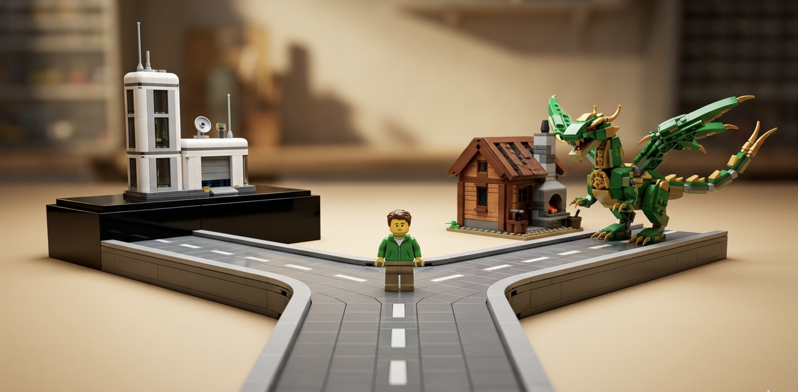 A LEGO road forking towards a platform on one side and a delivery workshop on the other